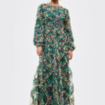 Woman wearing a floral dress on a white background